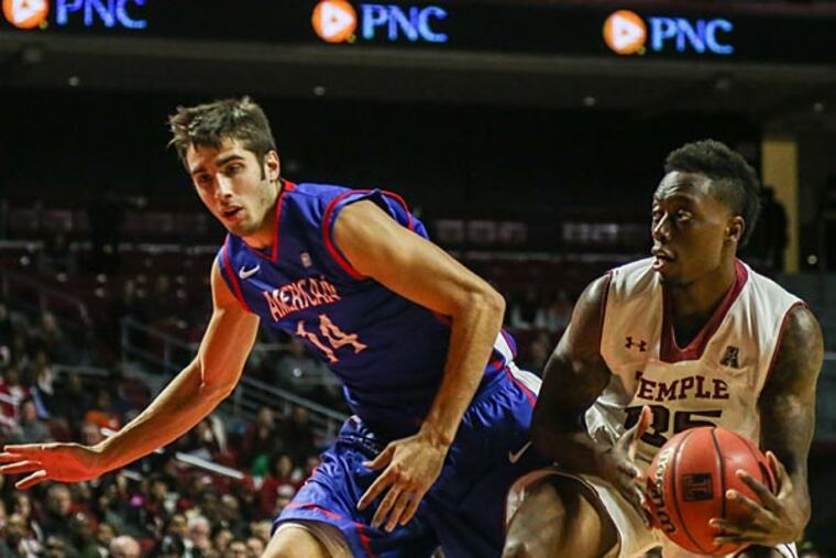 Temple guard Quenton DeCosey tries to shake a defender during the first half. (Andrew Thayer/Staff Photographer)