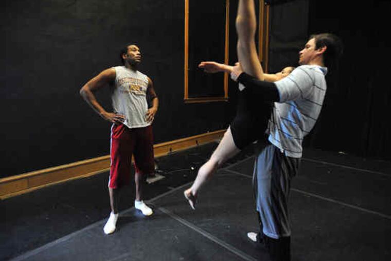 Choreographer Meredith Rainey at work with Rosalia Chann and Francis Veyette, the dancers in his new piece "Look Inside."