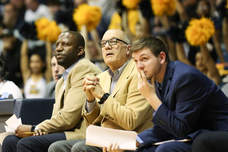 La Salle men’s basketball special assistant Joe Mihalich (center) watches during a game against VCU at Tom Gola Arena on Jan. 13.