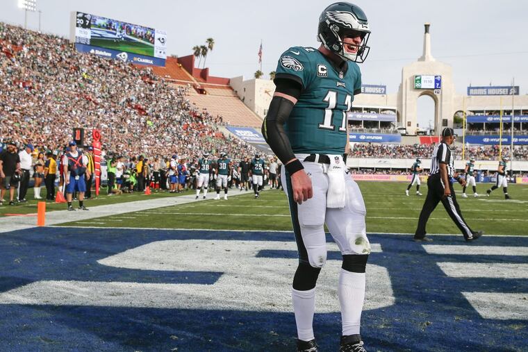 Eagles quarterback Carson Wentz celebrates a touchdown throw against the Los Angeles Rams on Sunday, December 10, 2017.
