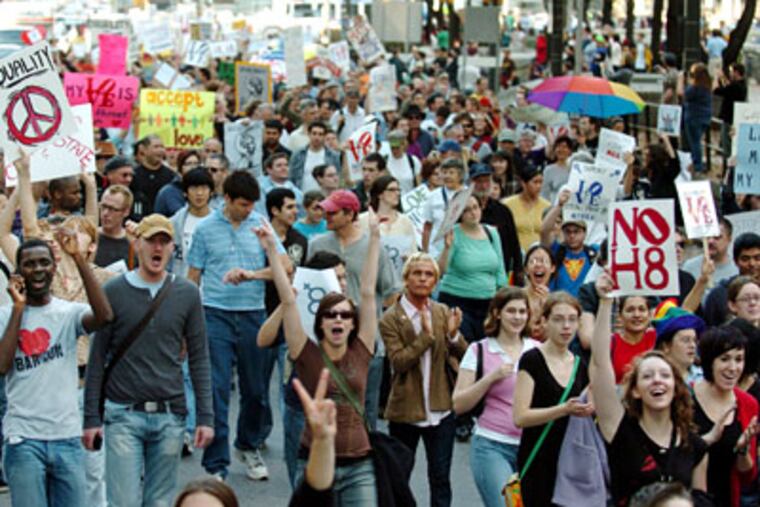 A crowd of several thousand march in the streets around City Hall to protest the passage of California's Proposition 8, which outlawed the marriage of same-sex couples. (Clem Murray / Staff Photographer)