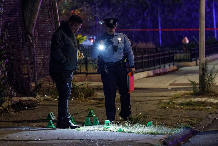 Police investigating on the 300 block of West Cumberland Street, where a 41-year-old man was fatally shot in a car Wednesday.