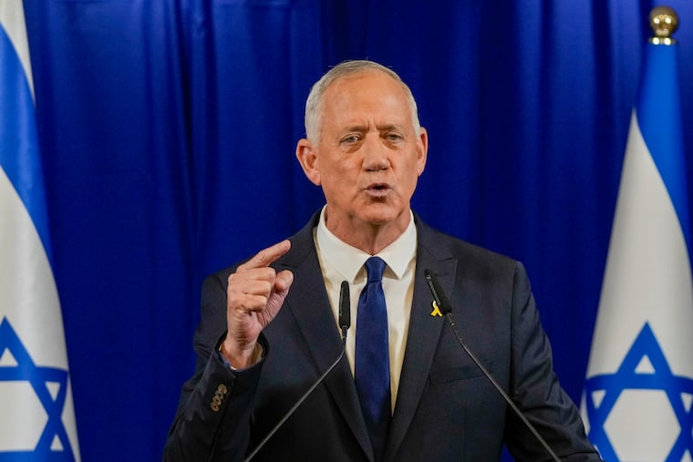 Benny Gantz, a centrist member of Israel's three-member war cabinet, announces his resignation in a statement in Ramat Gan, Israel, on Sunday.