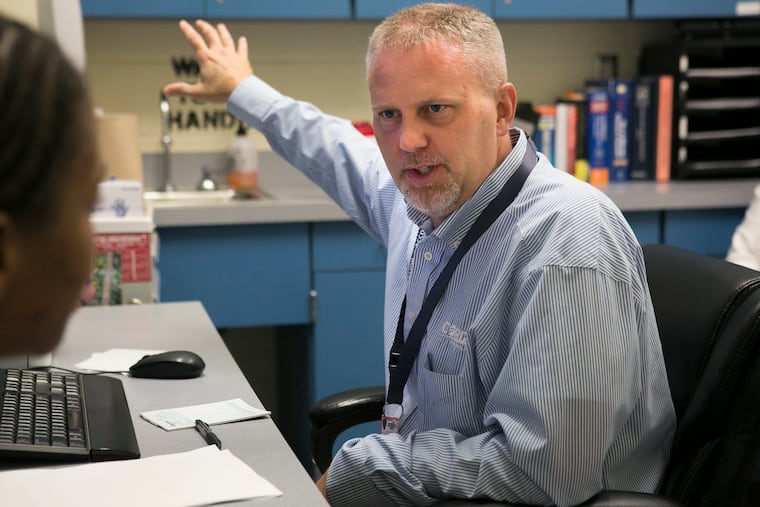 Riverside Correctional Facility physician John Lepley talks with an inmate in the facility's Suboxone program, one of the few such efforts in the nation.