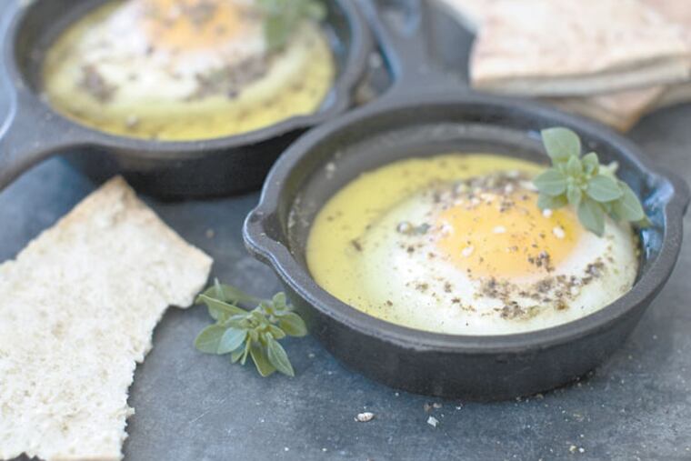 Oven eggs prepared with olive oil and the Egyptian spice blend called
dukkah.