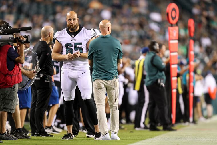 Eagles offensive tackle Lane Johnson (65) on the sideline during the fourth quarter of the preseason game against the New England Patriots at Lincoln Financial Field on Aug. 19.