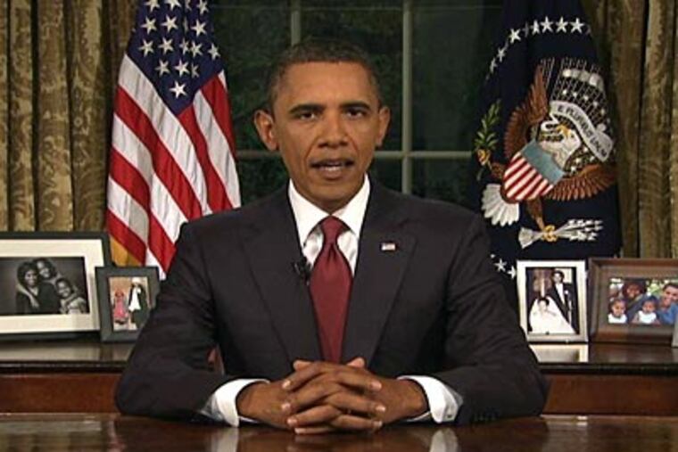 In this image from video, President Barack Obama speaks from the Oval Office at the White House on Tuesday about the end of the U.S. combat role in Iraq. (AP Photo/APTN)