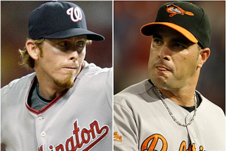 Mike MacDougal (left) saved 20 games for the Nationals in 2009. Danys Baez was 4-6 for the Orioles with a 4.02 ERA. (AP file photos)