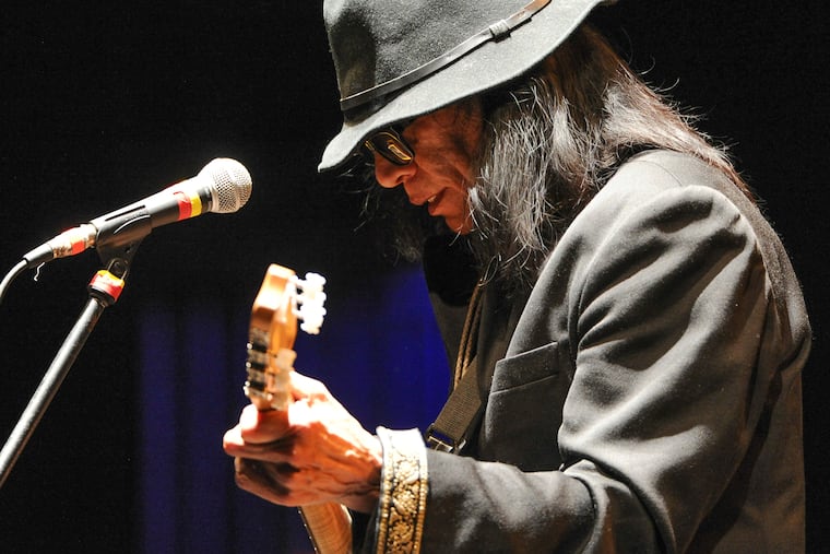 Singer-songwriter Sixto Rodriguez performs at the Beacon Theatre in 2013 in New York. Rodriguez, who became the subject of the Oscar-winning documentary “Searching for Sugarman” has died, according to the Sugarman.org website on Tuesday, and confirmed Wednesday by his granddaughter. He was 81.