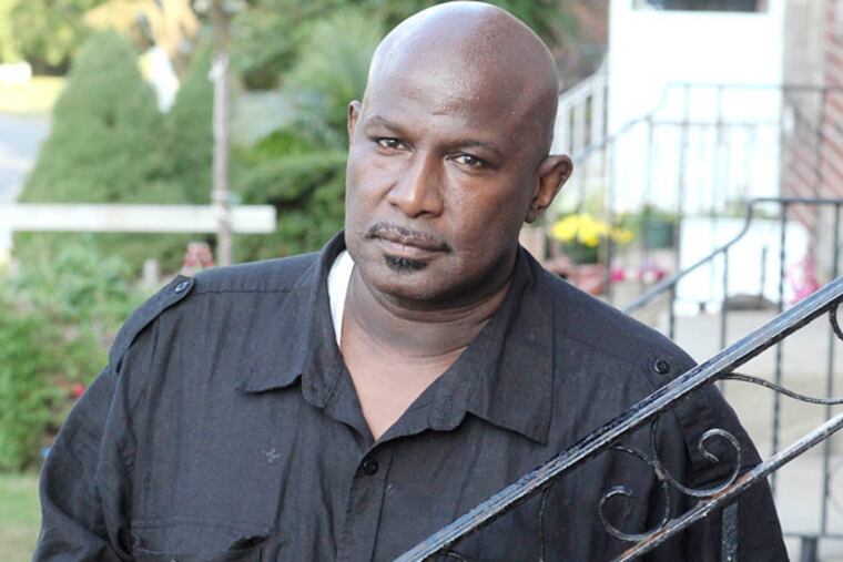 Injured ex-cop Herbert Spellman, 50, says he was stopped last fall without reason by Philadelphia police officers.