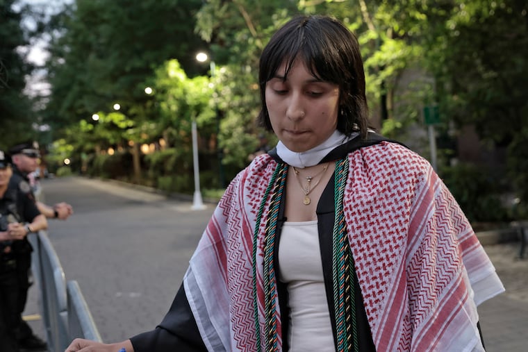Mira Sydow reacts to the University of Pennsylvania excluding her from the commencement ceremony for Penn's College of Arts and Sciences at Franklin Field. She was one of the students placed on leave in connection with the pro-Palestinian encampment.