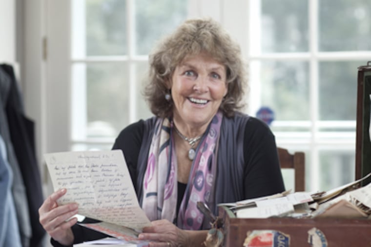 Bettina Hoerlin in her Chestnut Hill home with her parents' love letters. Her parents' love was forbidden in wartime Germany because her mother was Jewish while her father was not. (Ed Hille / Staff Photographer)