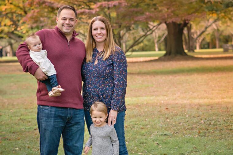 Chris and Lisa Rogers with Abby and infant Samantha.