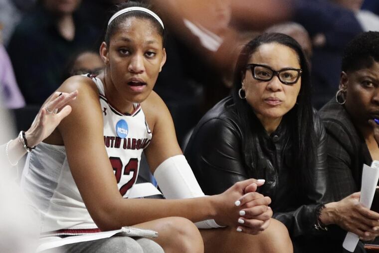 South Carolina star A’ja Wilson watches the game against Buffalo unfold with coach Dawn Staley.