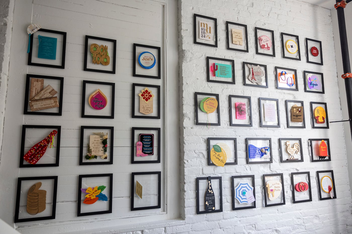 Menus from private dinners hosted by Carroll are framed and hung with Velcro so visitors can pop them off the wall to see both sides.