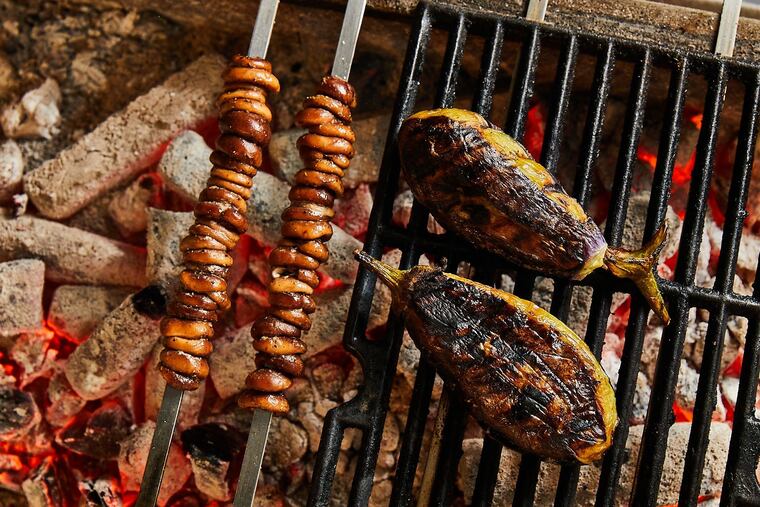 When grilling vegetables, like the shiitakes and eggplant pictured here, Laser Wolf executive chef Andrew Henshaw emphasizes that you should treat them just like you would meat. Give them some thought, ample seasoning, and time to marinate.