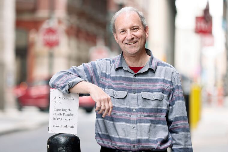Marc Bookman, co founder of Atlantic Center for Capital Representation, with his new book, “A Descending Spiral: Exposing the Death Penalty in 12 Essays.”