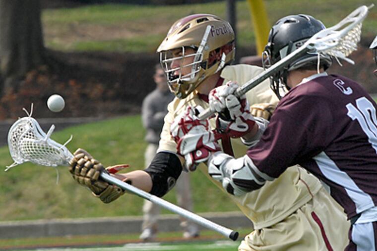 Haverford's Matt Walters and Conestoga's Kevin Rudd, fight for the ball. (April Saul / Staff Photographer)