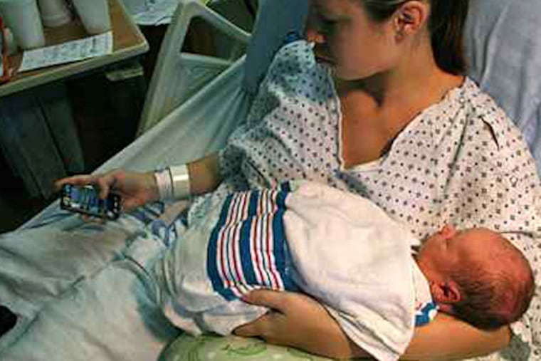 Less than four hours after Carina Slater, 25, of Bear, Del., gave birth to Curtis, she sent a group text. It included the date and time of his birth, his weight and length, and a photo. "You write it once, and it's out and it's done," says Slater. (Christopher Yasiejko)