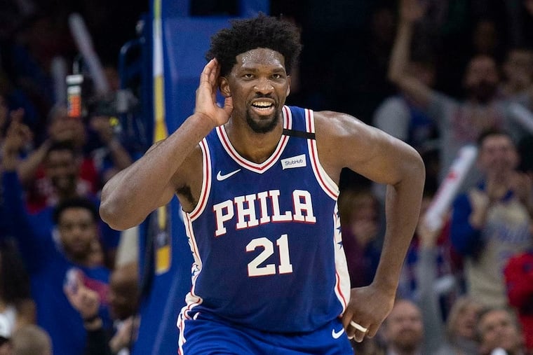 Joel Embiid reacts after scoring 49 points against the Atlanta Hawks.