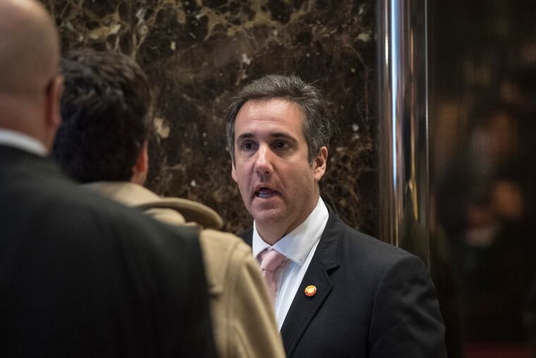 Michael Cohen, shown arriving at Trump Tower in New York in January 2017, has pleaded guilty to tax evasion, lying to Congress and violating campaign finance laws. The man who once bragged that he "would take a bullet for the president" would later release a recording he had secretly made of Donald Trump discussing hush-money payments.