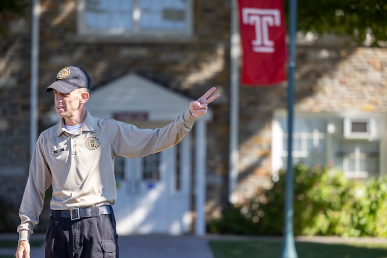 “It’s never too late to pursue your dreams,” said Chris Feder, 50, who has always dreamed of becoming a police officer. Last year, he left a higher-paying job to go to the police academy, and after graduation this week, he’ll become a Temple University police officer. Feder leads a new class of recruits through getting into proper formation during a flag ceremony on Temple’s Ambler campus.