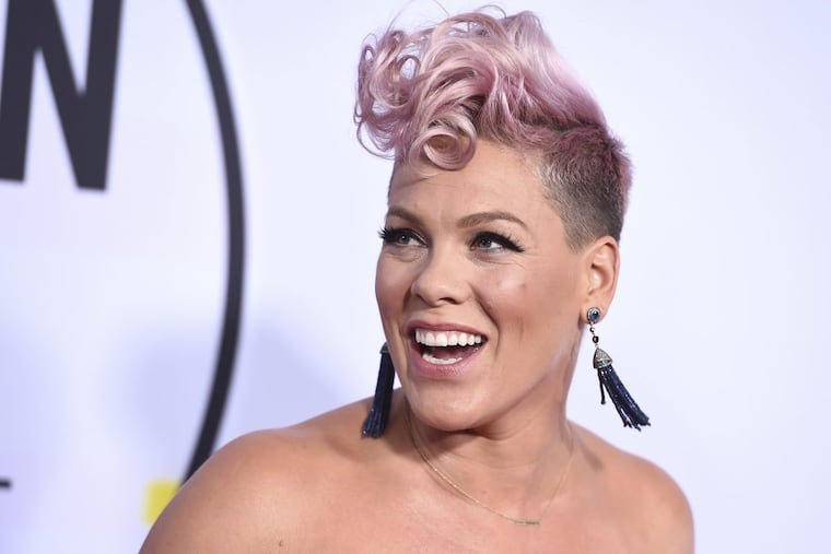 Pink arrives at the American Music Awards at the Microsoft Theater on Sunday, Nov. 19, 2017, in Los Angeles.