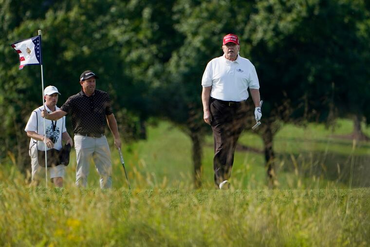 Former President Donald Trump plays golf at Trump National Golf Club in Sterling, Va., Tuesday, Sept. 13, 2022.
