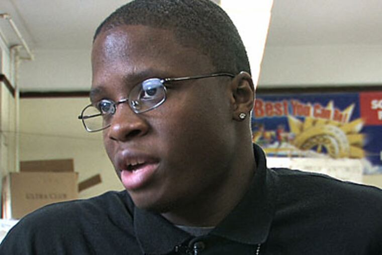 Overbrook High School senior Walter Pinder explains the colleges to which he has chosen to apply. (David Swanson / Staff Photographer )