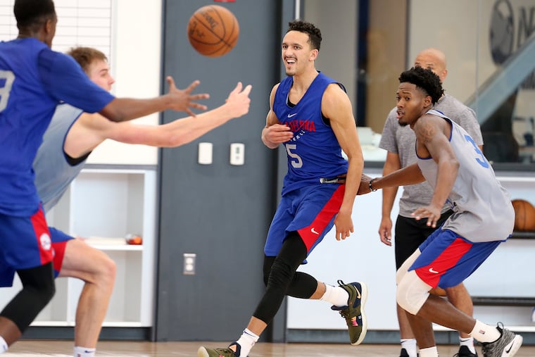 Landry Shamet, center, passes during a summer-league practice.