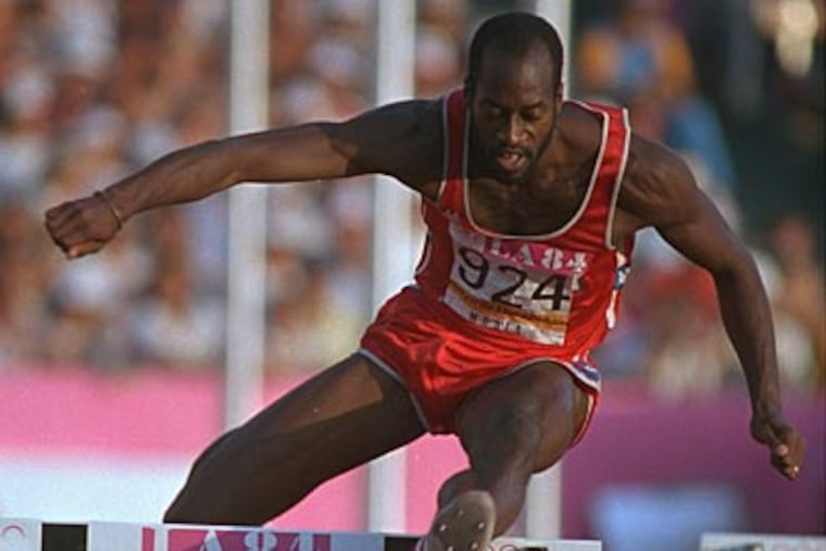 Edwin Moses clears the hurdle during his gold medal effort at the Olympics in 1984. (AP Photo)