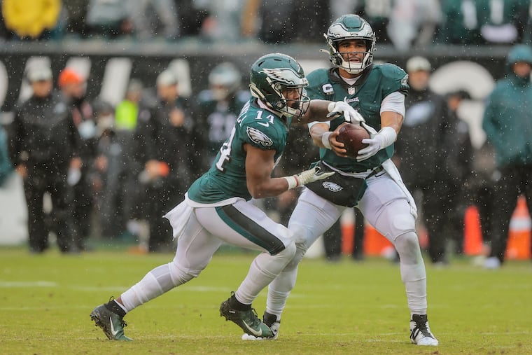 Jalen Hurts (right), Kenneth Gainwell, and the Eagles will put their undefeated record on the line Sunday at Arizona.
