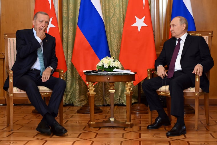 Russian President Vladimir Putin, right, speaks to Turkish President Recep Tayyip Erdogan during their meeting at Russia's Black Sea resort of Sochi, Russia, on Monday, Sept. 4, 2023.