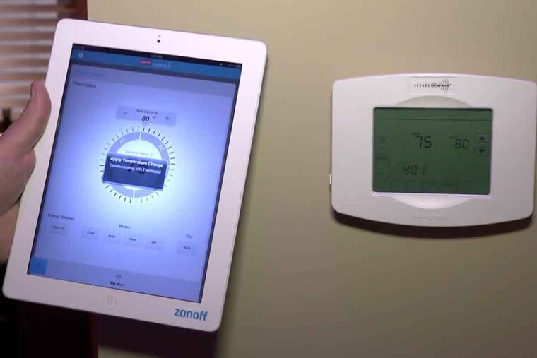 Screen grab from a Zonoff information video showing the use of an iPad to control a thermostat.