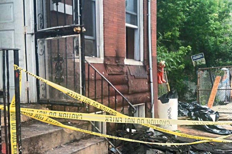 Two people were killed in a house fire at 1513 N. 6th St. Phila. ( Jane M . Von Bergen/ Staff Photographer)
