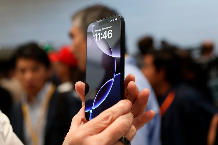 The new iPhone 16 is displayed during an announcement of new products at Apple headquarters in September 2024 in Cupertino, Calif.