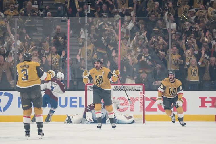 Vegas Golden Knights' Mark Stone (center) celebrates after scoring a goal during the first period of Game 4 of the Western Conference finals against the Colorado Avalanche.