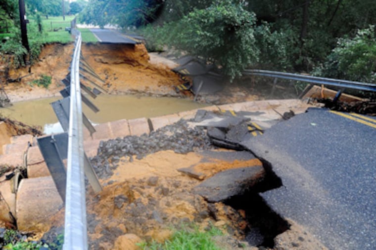 A section of Beebe Run Road near Bridgeton, Cumberland County, was washed away Sunday by heavy rain. Parts of South Jersey got more than 11 inches. (Clem Murray / Staff Photographer)