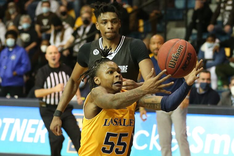 Khalil Brantley of La Salle temporarily loses control of the ball as he drives the lane against St. Bonaventure during the 2nd half on Jan. 11, 2022.