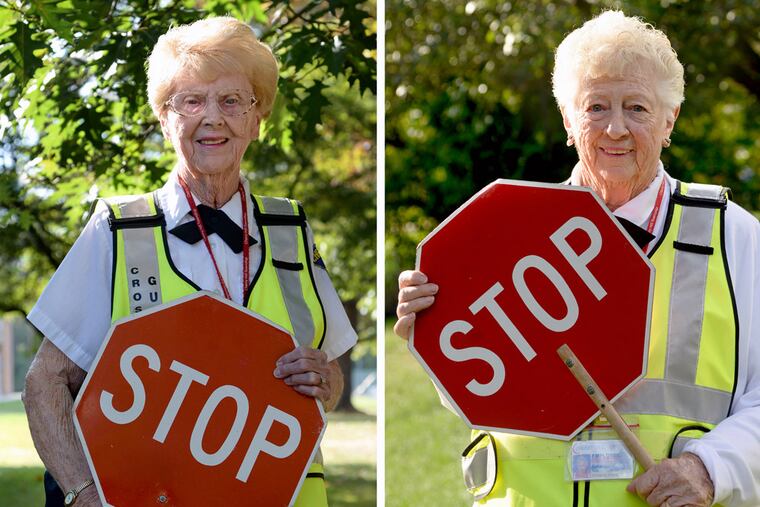 Claire Bauman (left), 87, at Horace Mann Elementary School, and Helen Nitz, 88, at A. Russell Knight Elementary School, pose at their respective schools Oct. 8, 2015. (TOM GRALISH/Staff Photographer)