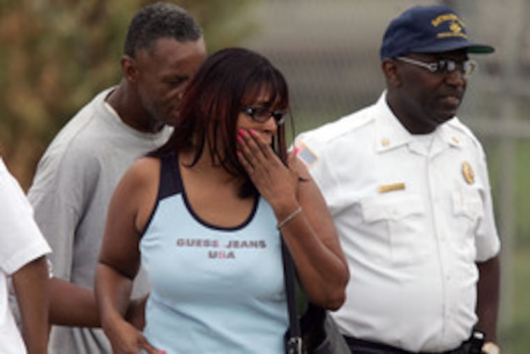 Friends and family of Floyd Nelson arrive at the Hays Tug & Launch Co. wharf in Chester City.