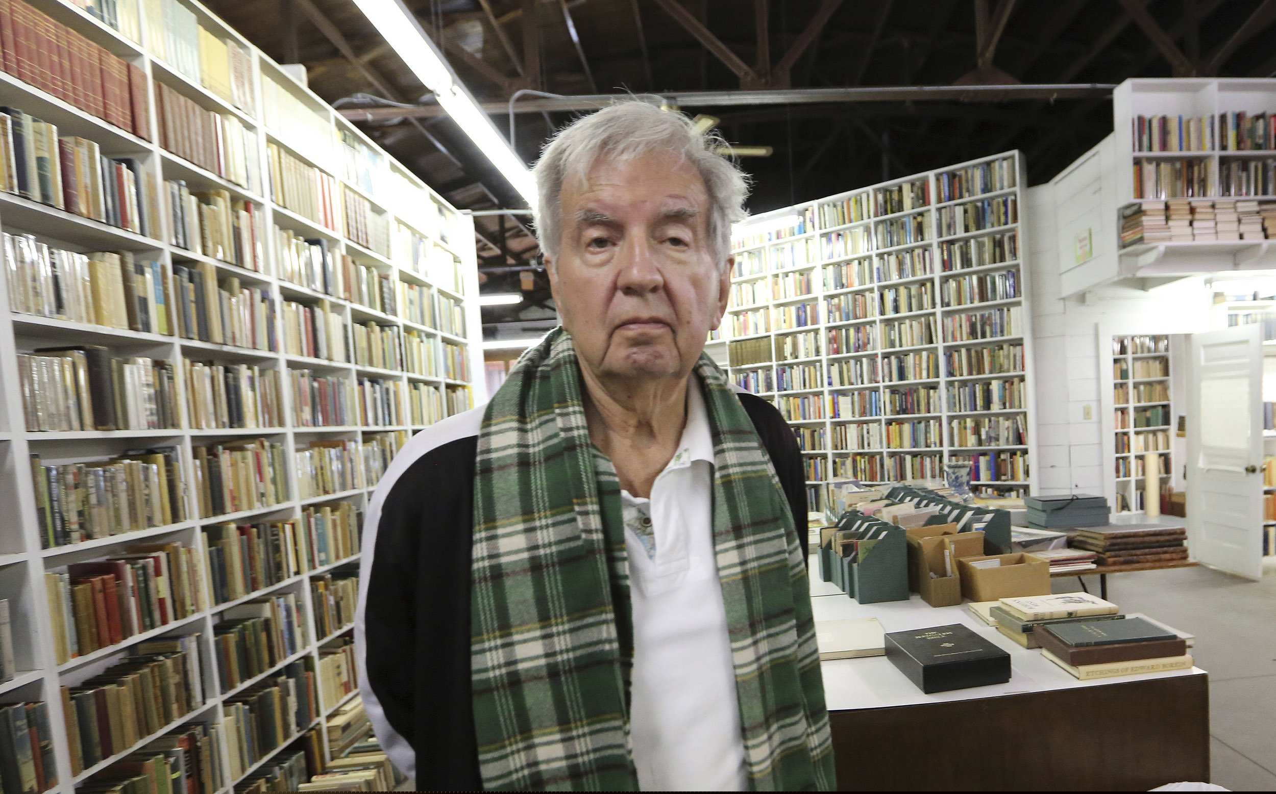 In this April 2014 photo, Pulitzer Prize-winning author Larry McMurtry posed at his book store in Archer City, Texas.