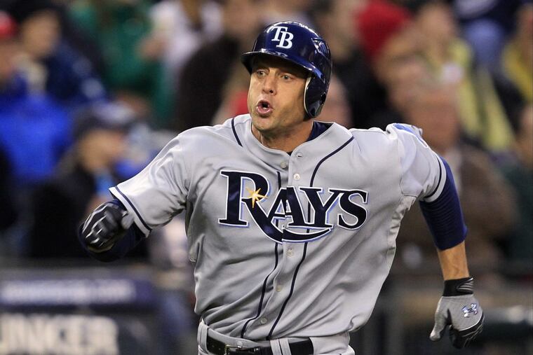 The Tampa Bay Rays' Gabe Kapler races home to score a run in a May 2010 game.