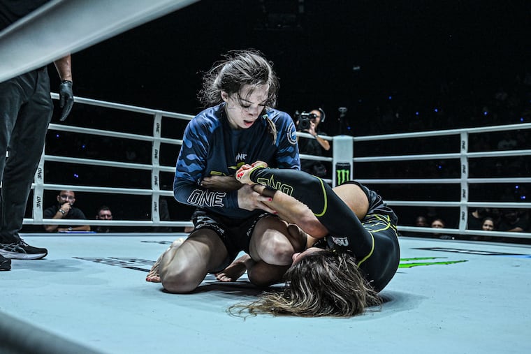 Philly native Danielle Kelly (left) will take Mayssa Bastos in a rematch for the women’s atomweight submission grappling title on Friday.