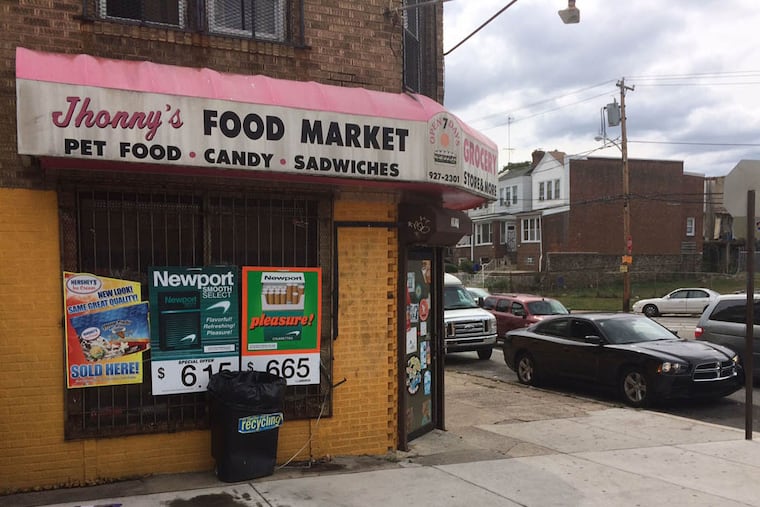 Jasmine Williams, who was eight months pregnant, was fatally shot outside of this Ogontz corner store yesterday morning. Another man was also wounded. (David Gambacorta / DAILY NEWS STAFF)