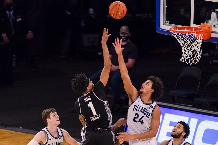 Georgetown forward Jamorko Pickett (1) goes to the basket against Villanova forward Jeremiah Robinson-Earl.