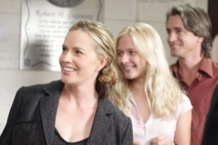 Carly Schroeder (center) plays the girl redeemed by sport, with Elisabeth Shue and Dermot Mulroney as her parents. The film was inspired by Shue who, as a high school student, fought to play boys' varsity soccer.