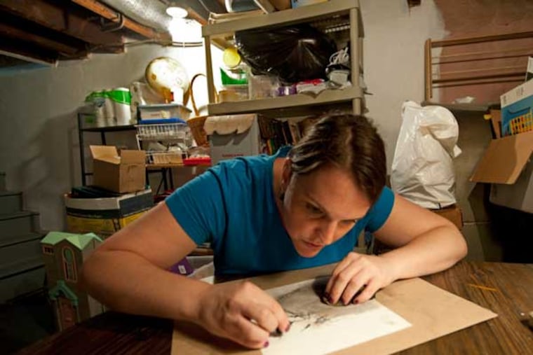 Artist Jamie Wasson works in her South Philadelphia home. The Philadelphia Museum of Art and Wills Eye Institute celebrate 25 years of collaborating on art programs with an exhibit at Wills Eye on July 2. (April Saul / Staff Photographer)