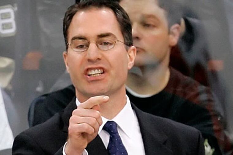 In a conference call with reporters, now-former Flyers coach John Stevens said he felt "responsible" for letting people down (Gene J. Puskar/AP file photo)