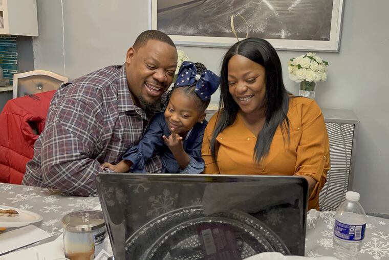 William and Denise Perkins with 5-year-old Azuri, whom they adopted in January.